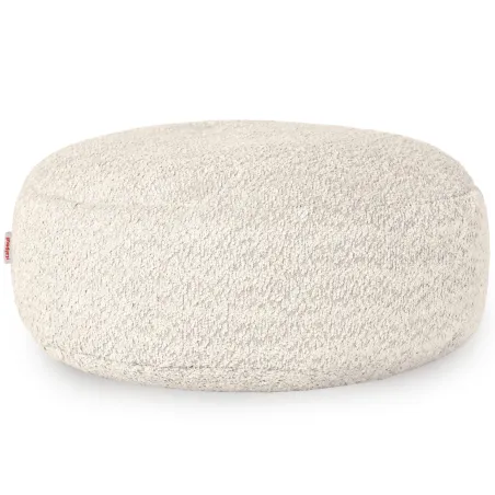 Pouf rond en tissu bouclé, texture douce et design moderne
