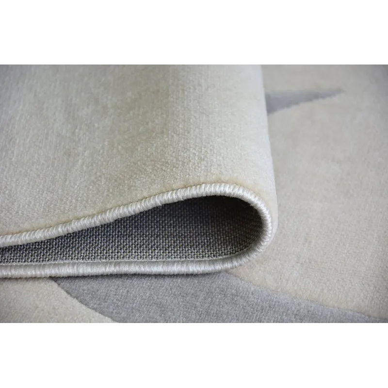 Tapis élégant crème, idéal pour des intérieurs modernes