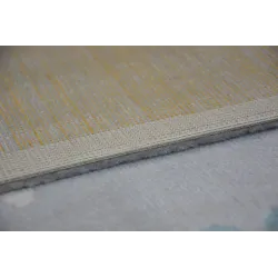 Tapis de jardin en gris et crème avec accents turquoise