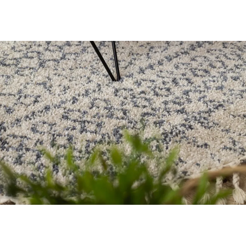 Tapis circulaire crème et gris, idéal pour le salon