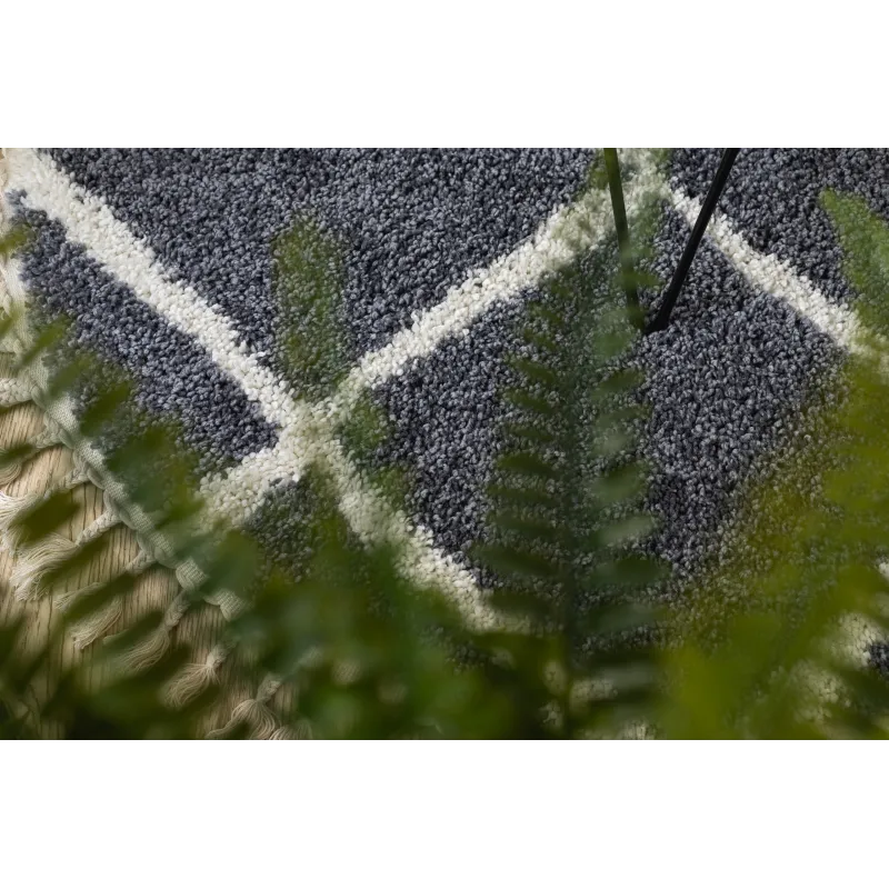 Tapis gris élégant, parfait pour un intérieur moderne et chaleureux