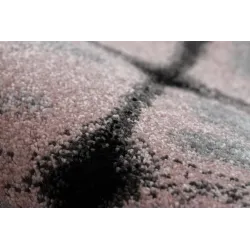 Tapis doux, parfait pour se détendre dans le salon