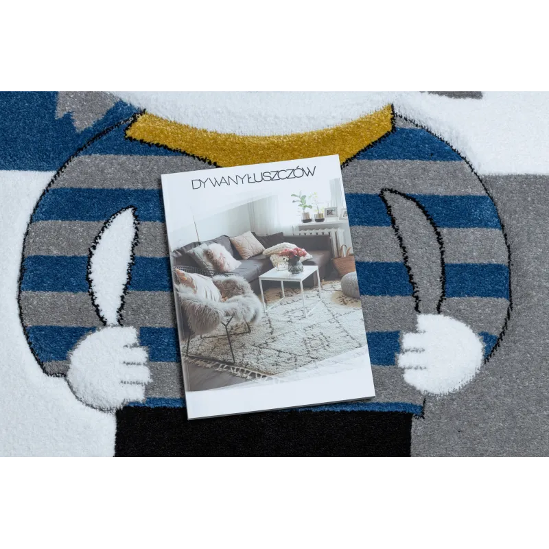 Tapis bleu avec un thème de pirate, idéal pour la chambre d'enfant