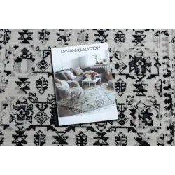 Tapis vintage classique en beige, ajout élégant à votre décoration intérieure