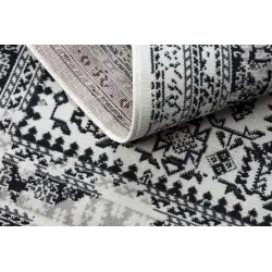 Tapis vintage beige, doux et agréable au toucher, parfait pour la chambre