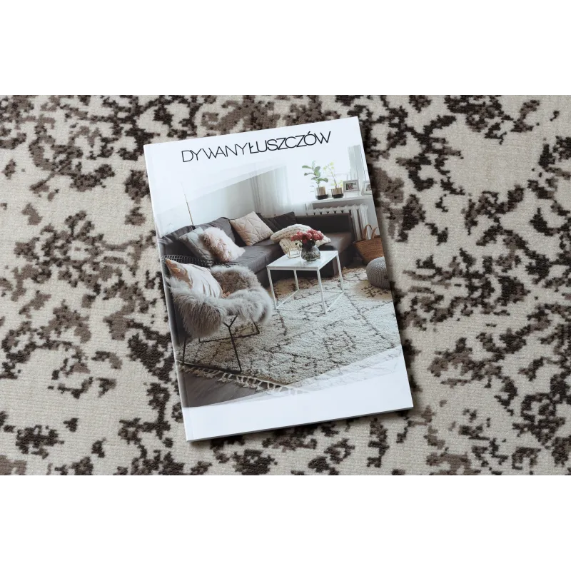Tapis vintage élégant beige, parfait pour des intérieurs classiques