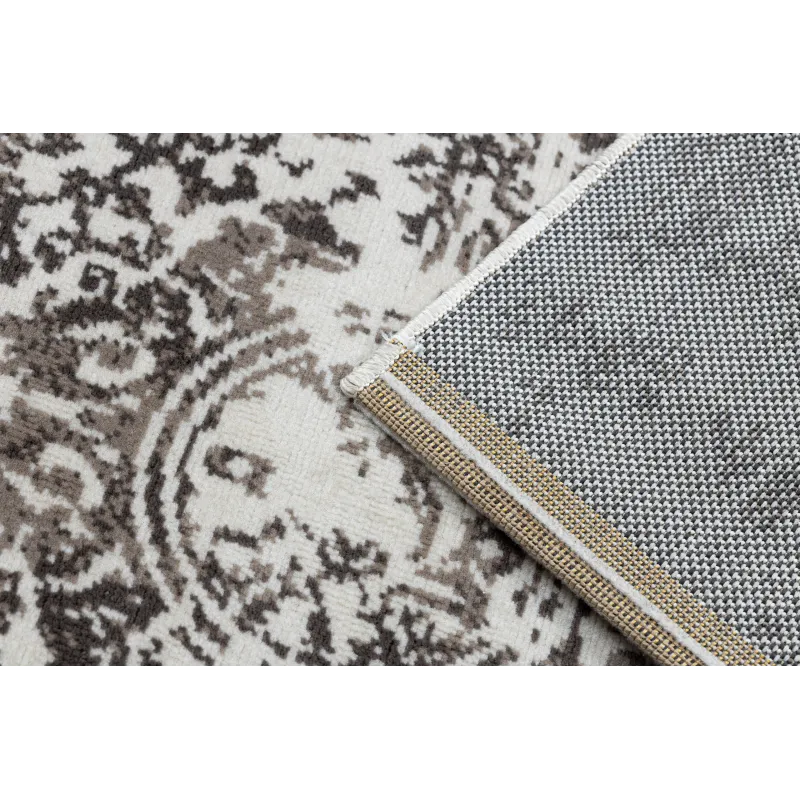 Tapis vintage doux beige, idéal pour les chambres à coucher
