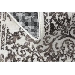 Tapis vintage beige, idéal pour l'extérieur ou les terrasses