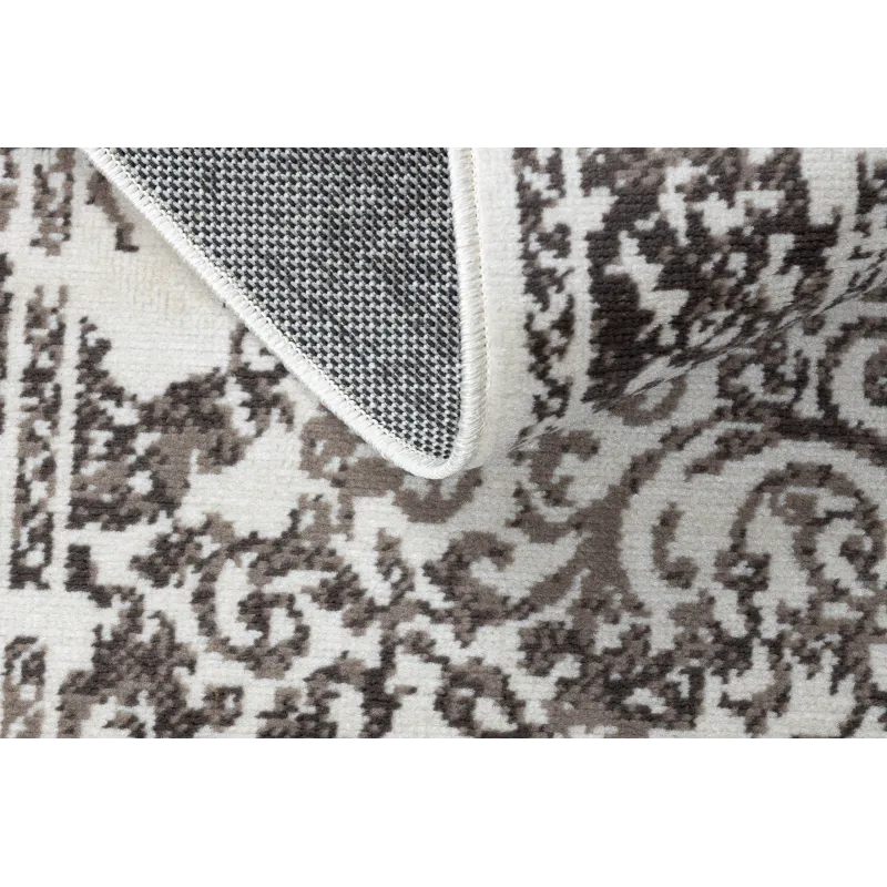 Tapis vintage beige, idéal pour l'extérieur ou les terrasses