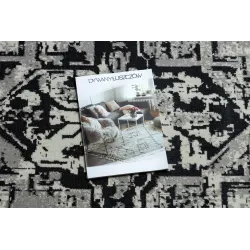 Tapis élégant vintage gris et noir, parfait pour le salon