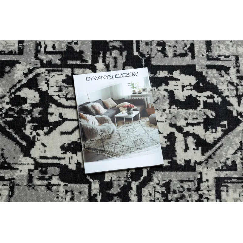 Tapis élégant vintage gris et noir, parfait pour le salon