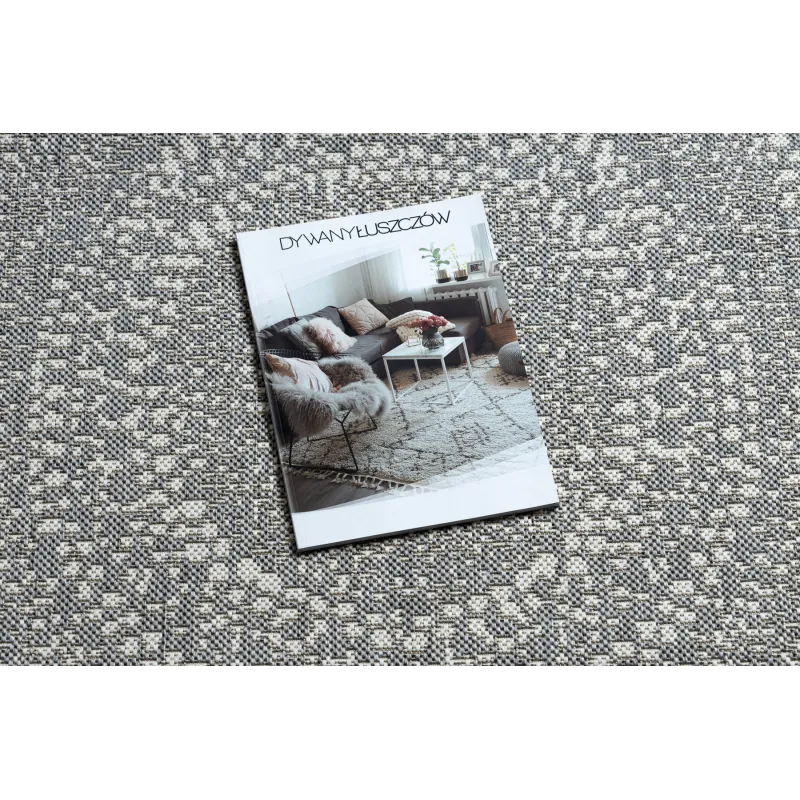 Tapis circulaire en sisal gris, un ajout élégant pour le salon