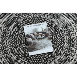 Tapis noir rond au style boho, parfait pour le salon