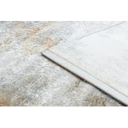Tapis avec texture douce, parfait pour le salon ou la chambre