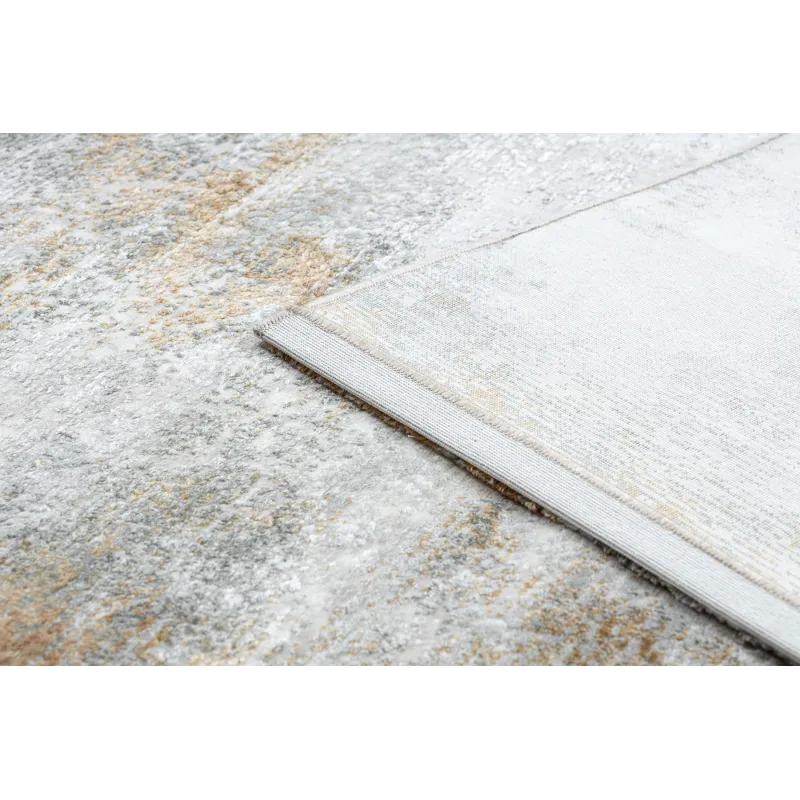 Tapis avec texture douce, parfait pour le salon ou la chambre