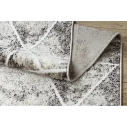 Tapis de haute qualité, doux et agréable au toucher, idéal pour le salon