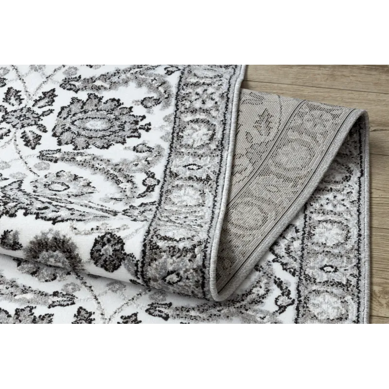 Tapis structuré gris avec fleurs pour la chambre