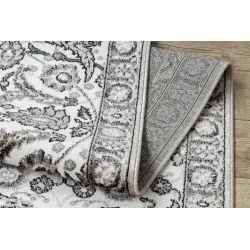 Tapis de haute qualité avec un design structurel gris et beige, durable