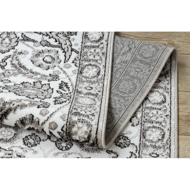 Tapis de haute qualité avec un design structurel gris et beige, durable