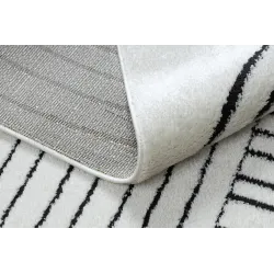 Tapis parfait pour les intérieurs modernes, idéal pour le salon ou la chambre
