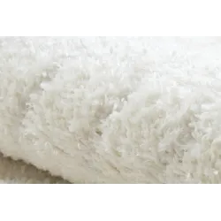 Tapis crème, idéal pour les chambres d'enfants ou les aires de jeux