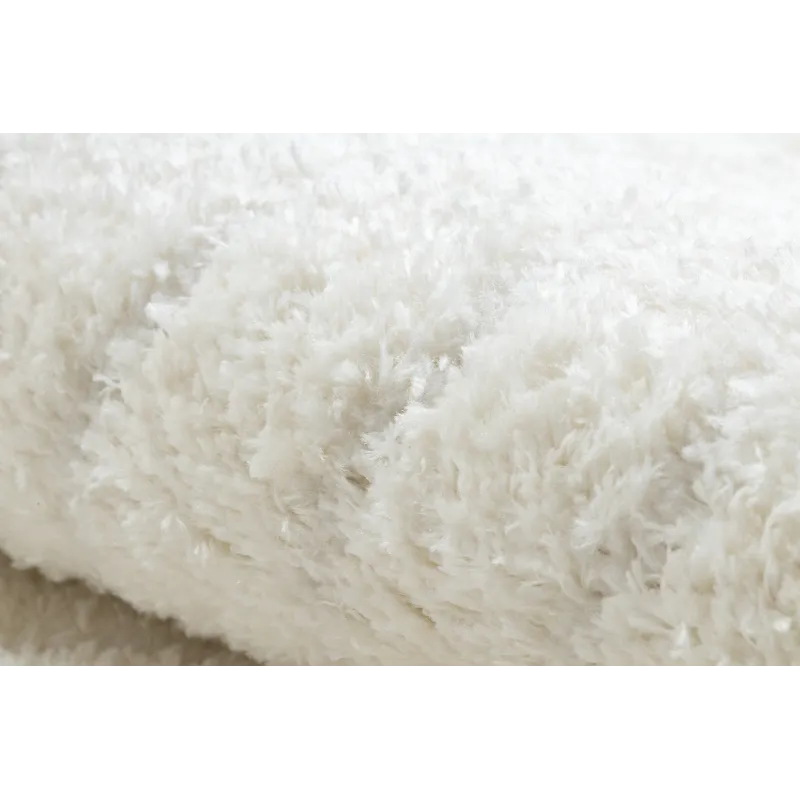 Tapis crème, idéal pour les chambres d'enfants ou les aires de jeux