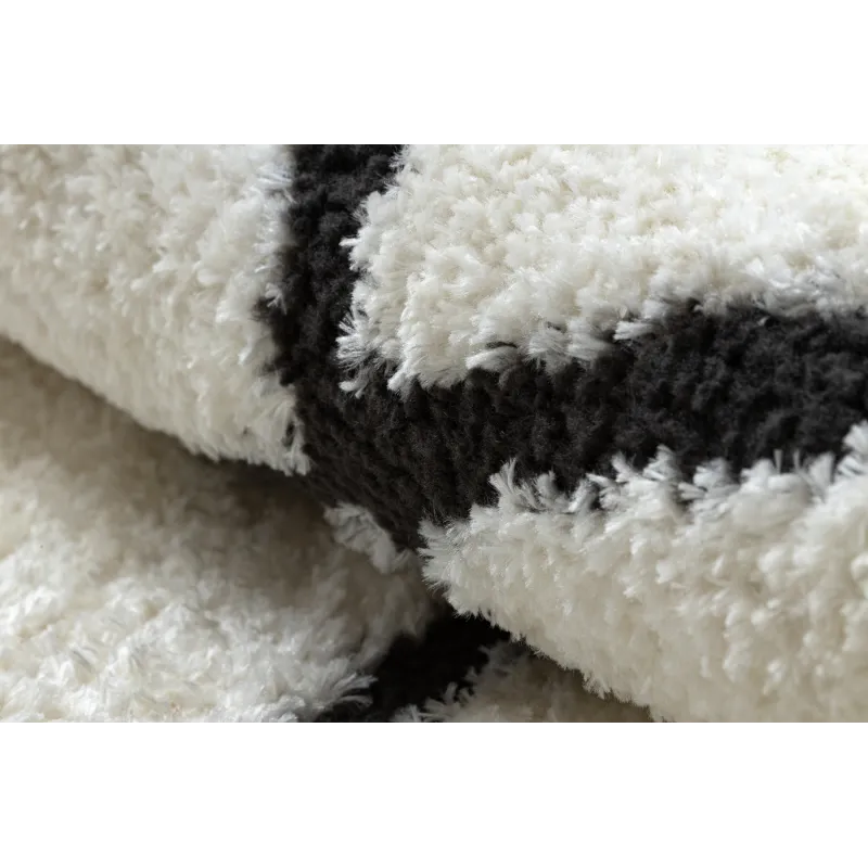 Tapis idéal pour les chambres, crème et noir dans un style moderne