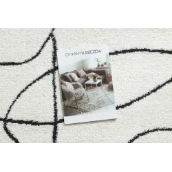 Tapis moderne élégant crème et noir, idéal pour toute décoration intérieure