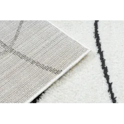 Tapis moderne avec un motif unique, idéal pour des intérieurs stylés