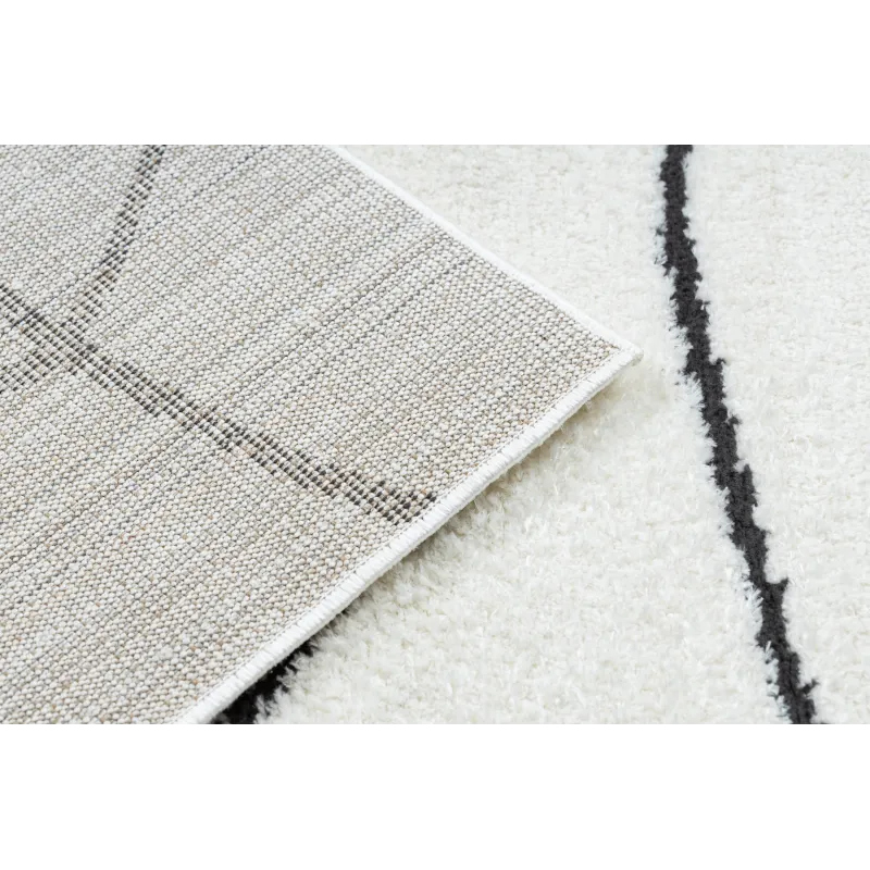 Tapis moderne avec un motif unique, idéal pour des intérieurs stylés