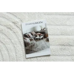 Tapis crème avec motif géométrique, parfait pour la chambre