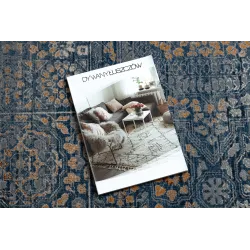 Tapis élégant bleu et orange avec motifs