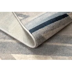 Tapis pour le salon, design géométrique, ajoute du caractère à l'espace