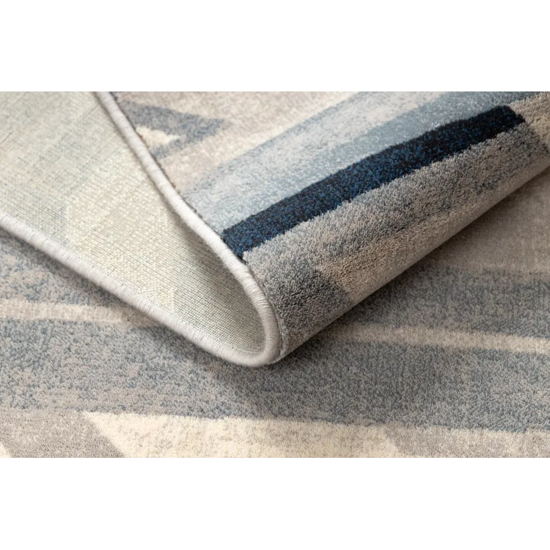 Tapis pour le salon, design géométrique, ajoute du caractère à l'espace