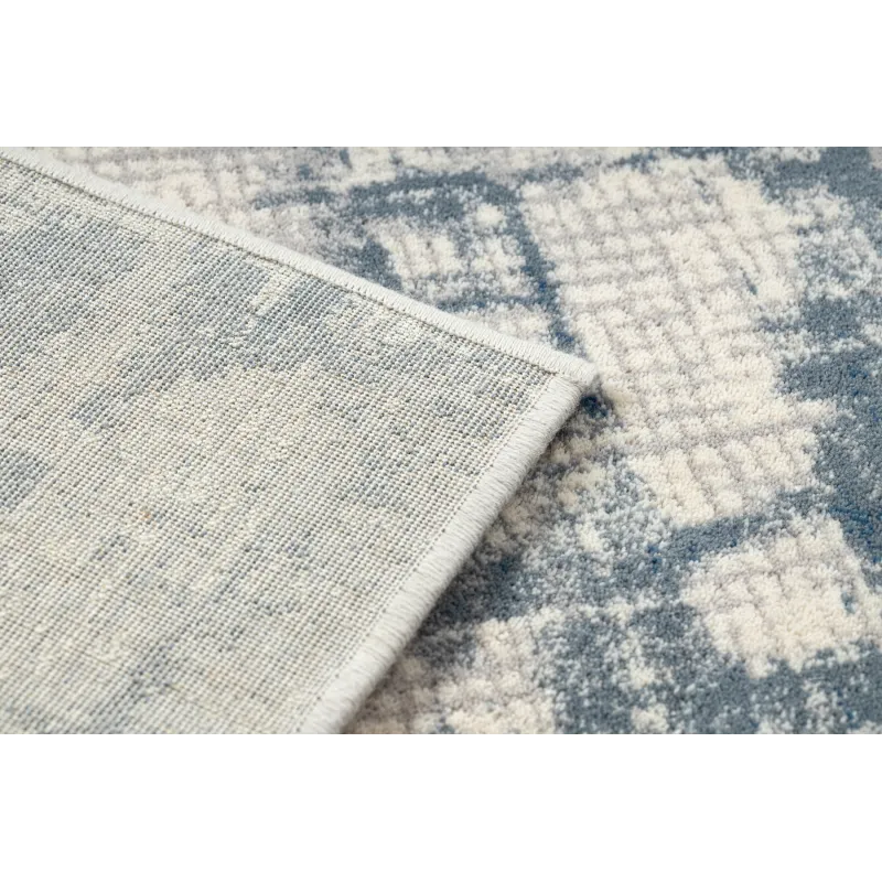 Tapis doux au style vintage, idéal pour la chambre
