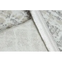 Tapis doux et texturé, parfait pour le salon ou la chambre à coucher