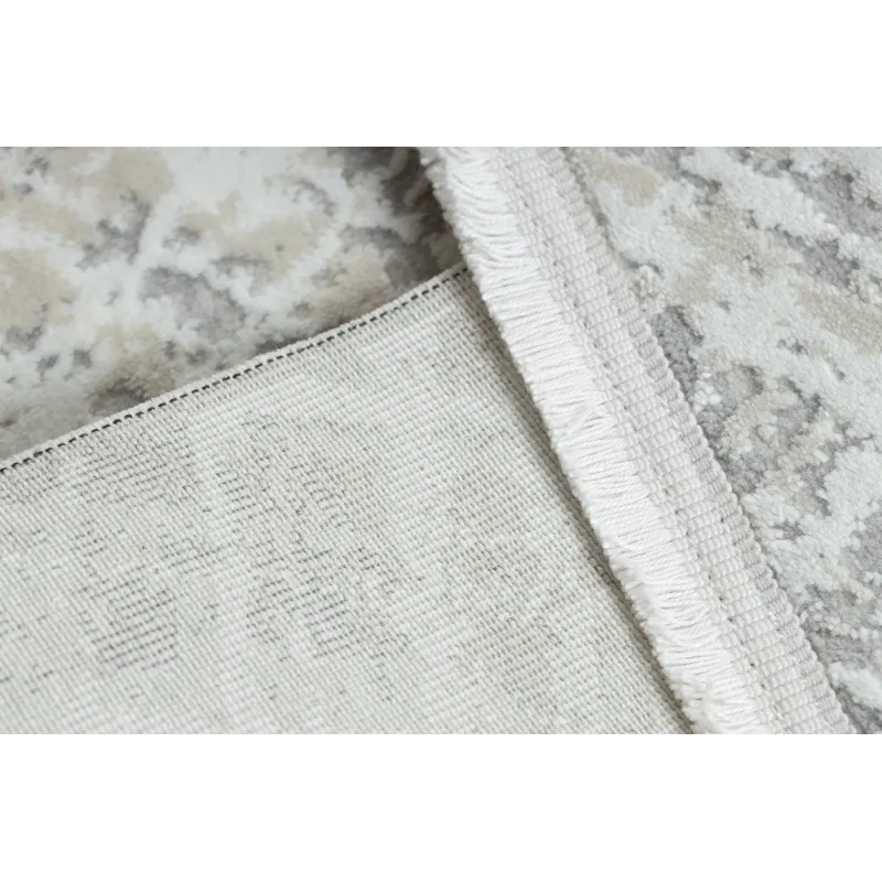 Tapis doux et texturé, parfait pour le salon ou la chambre à coucher