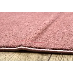 Tapis rose doux, parfait pour la décoration du salon