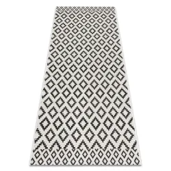Tapis en sisal crème et noir, motif losanges, pour un intérieur contemporain