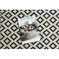 Tapis élégant en sisal crème et noir, parfait pour le salon contemporain