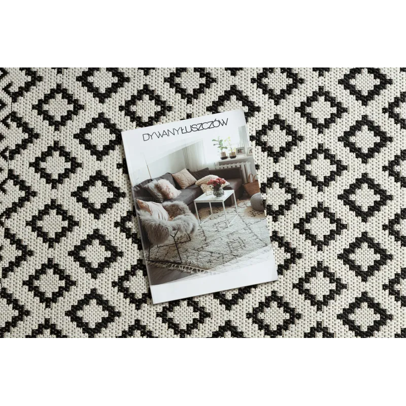 Tapis élégant en sisal crème et noir, parfait pour le salon contemporain