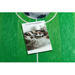 Tapis pour enfants vert avec motif de terrain de football