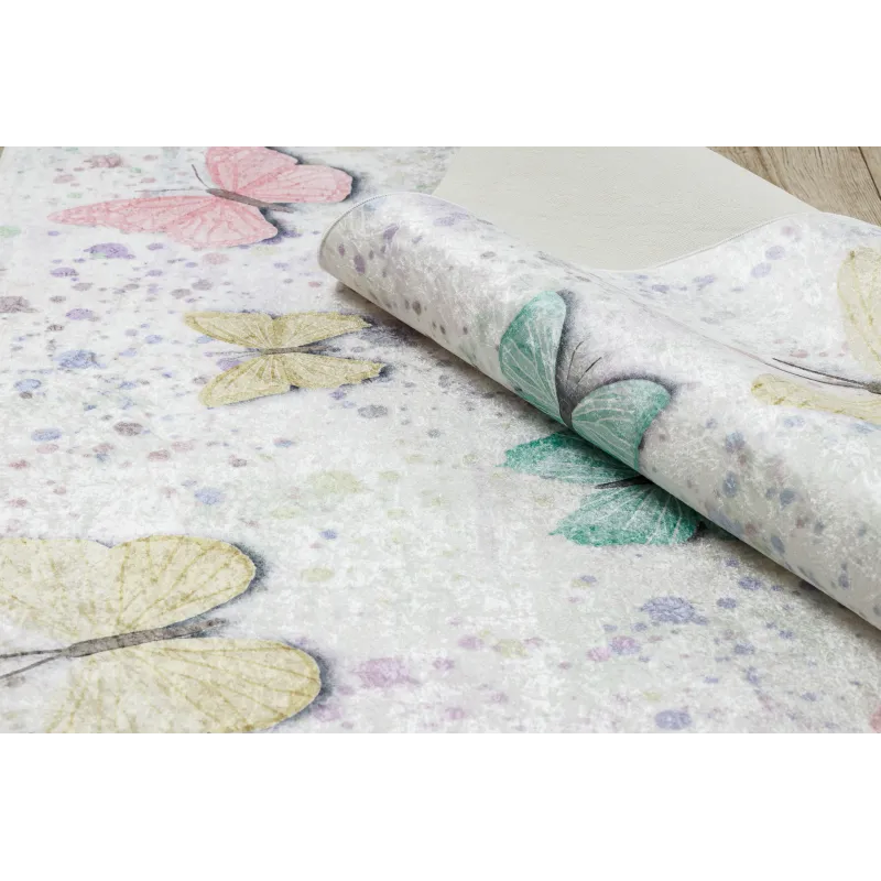 Tapis crème BAMBINO 1610 avec des papillons, parfait pour la chambre d'enfant
