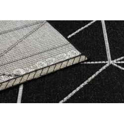 Tapis en sisal texturé noir et argent, ajoutant de l'élégance à n'importe quel espace