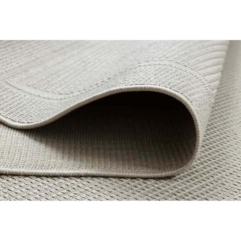 Tapis TIMO 5979, parfait pour les zones de détente en extérieur