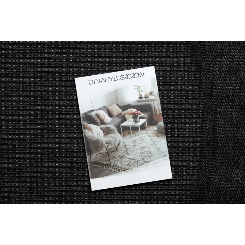 Tapis noir en sisal de forme ronde, accessoire élégant pour le jardin