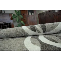 Tapis à surface lisse, idéal pour le salon ou la chambre