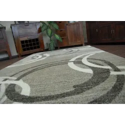 Tapis élégant pour intérieurs modernes, idéal pour jardins ou terrasses