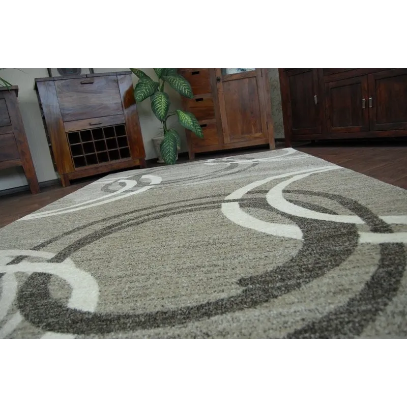 Tapis élégant pour intérieurs modernes, idéal pour jardins ou terrasses
