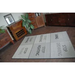 Tapis argent en sisal FLOORLUX 20275 YOLO, parfait pour les intérieurs modernes